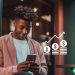 man using one of the best micro investing apps