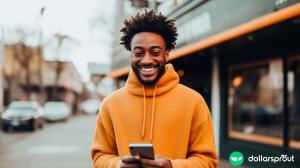 man researching the best money saving apps to download