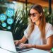 woman on laptop creating a cold email campaign