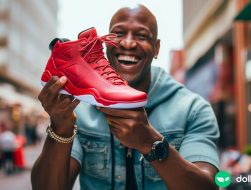 man holding discounted basketball shoes