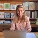 A 47 year old woman working from home on her laptop as an Outschool teacher.