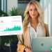 A blonde woman with a Macbook, looking at the camera with a soft smile. There is a Shopify earnings graphic overlaid showing over $500k in revenue.