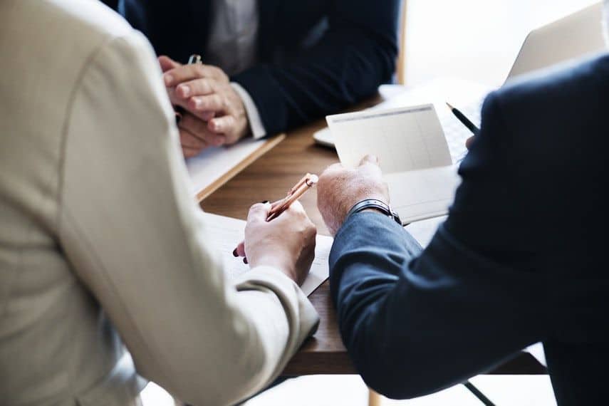 meeting with a loan officer and real estate agent