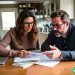 A married couple going over their finances together.