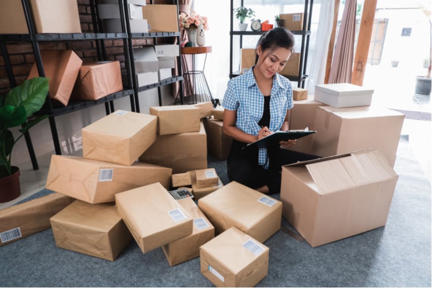 woman listing items to sell online